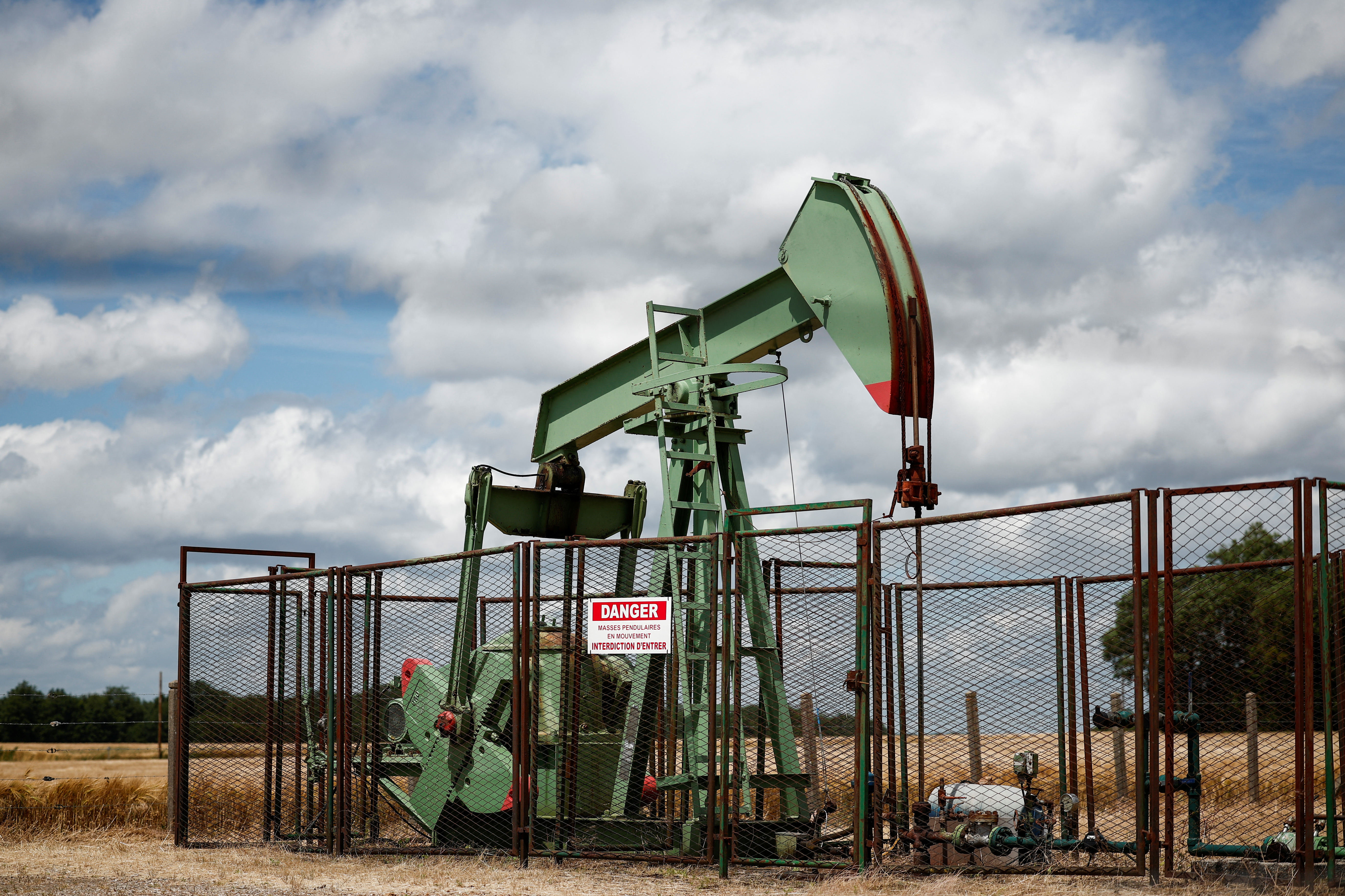 Oil climbs nearly three pct as price drop triggers buying; oversupply worries weigh