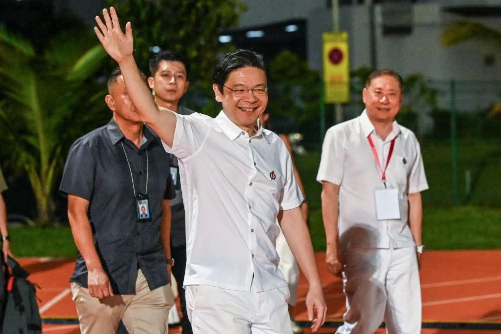 狮城大选：安华贺总理黄循财获胜