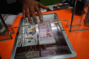 Ringgit ends lower vs US dollar, major currencies on weak demand