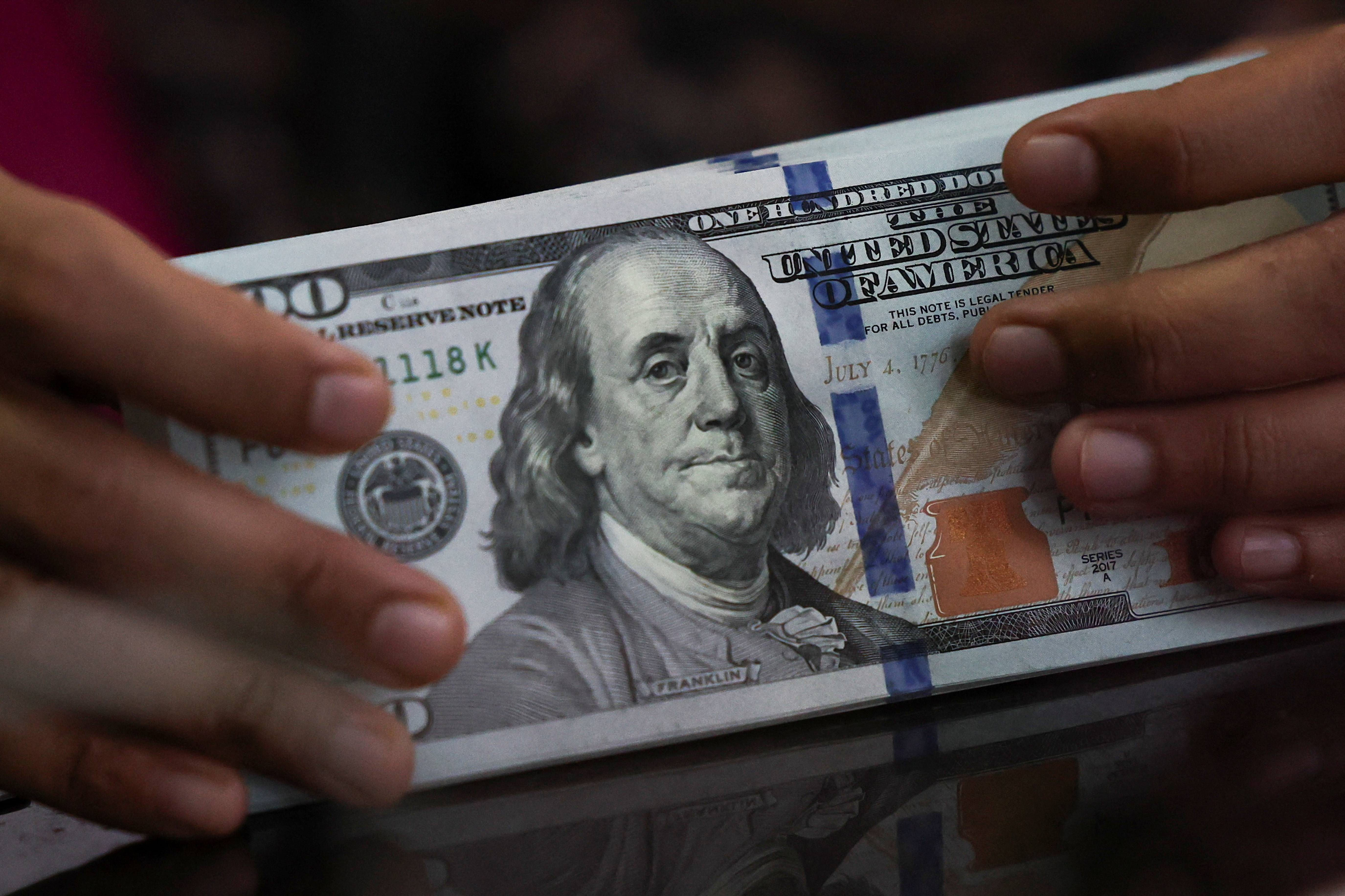 Ringgit closes lower against greenback ahead of US inflation data