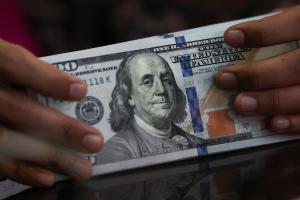 Ringgit closes lower against greenback ahead of US inflation data