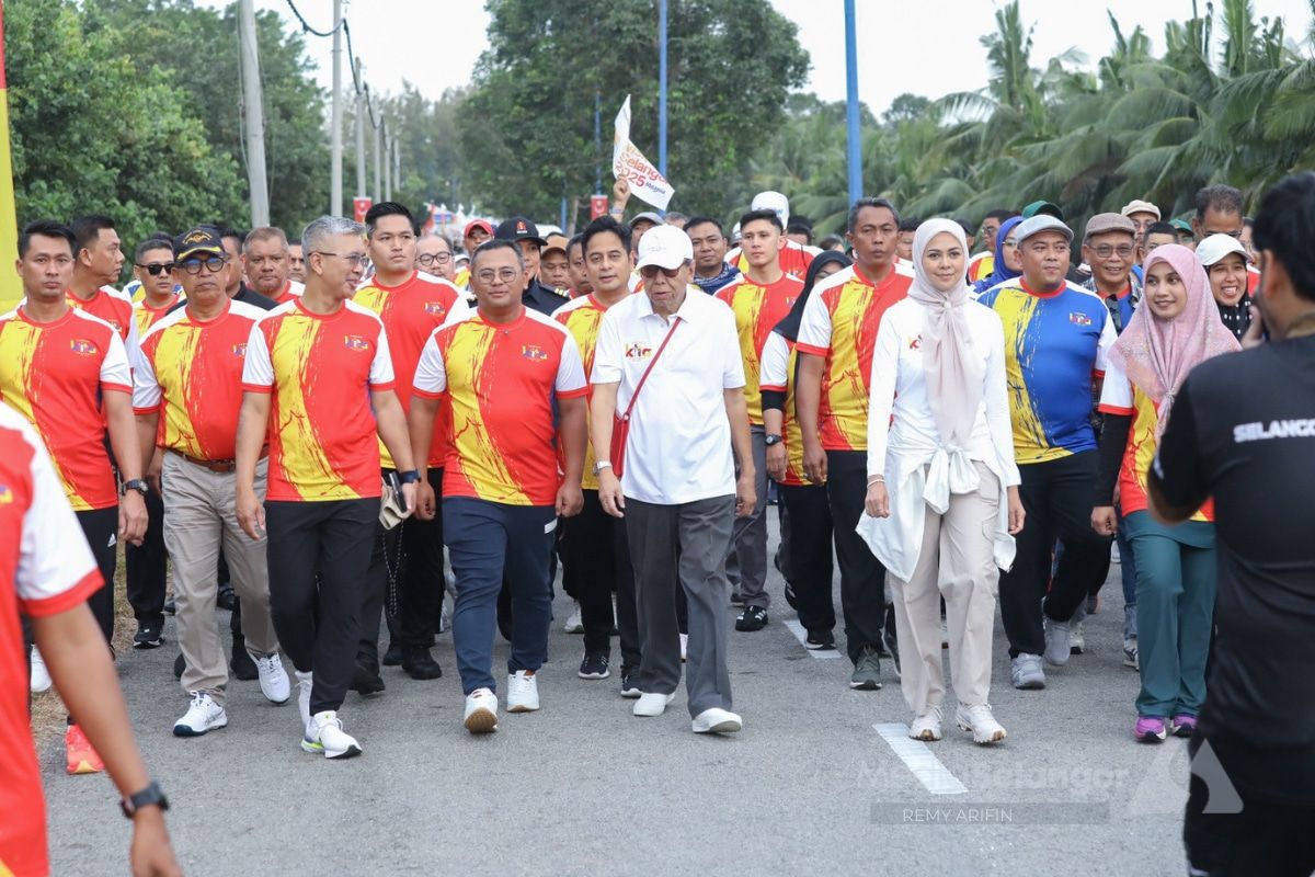 雪州苏丹伉俪参与海节 与民同乐及竞跑