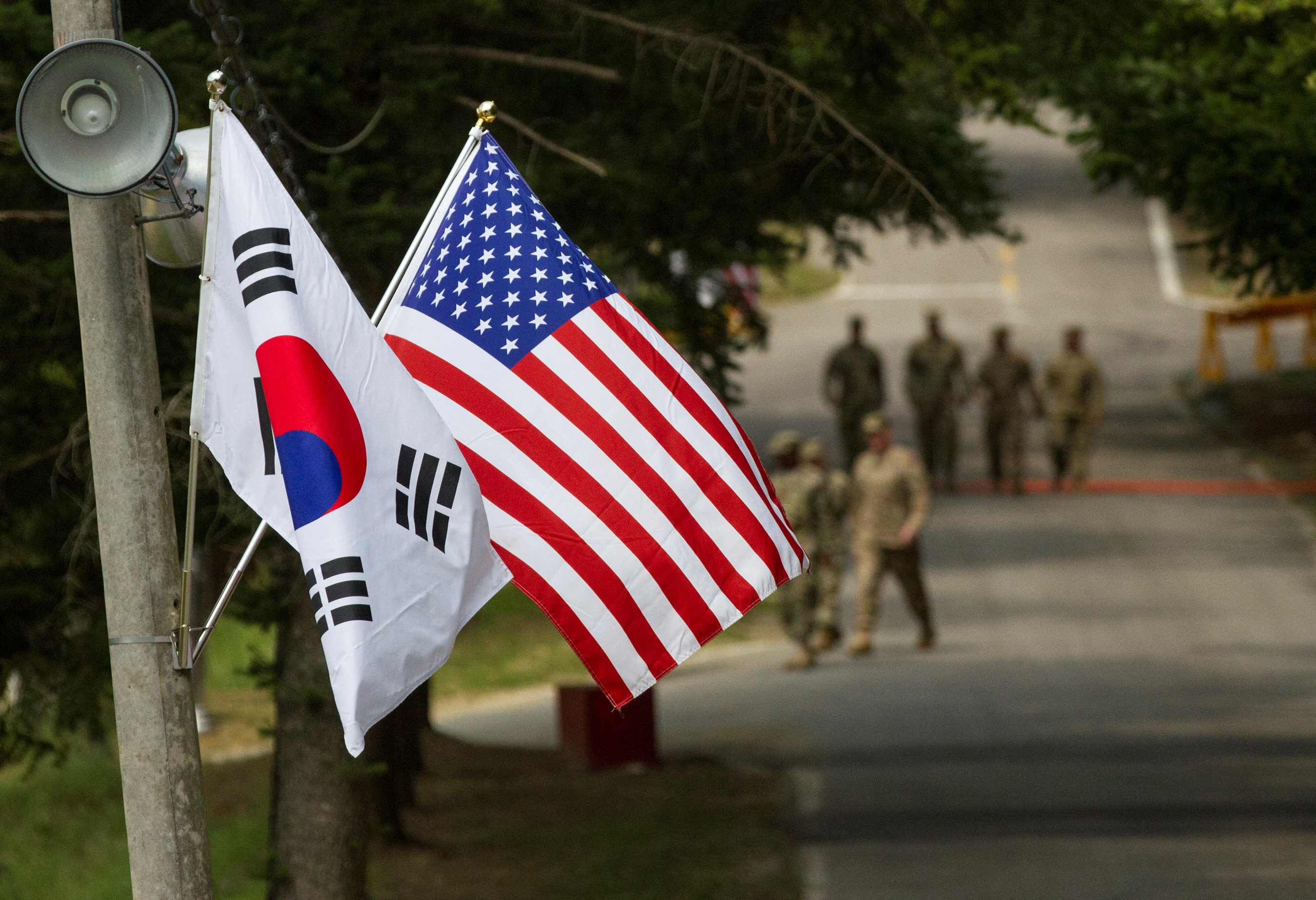 South Korea cites previously agreed terms on sharing defense costs after Trump's demand