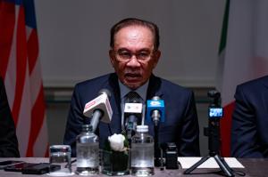 Anwar says proposed carbon tax won’t hinder investors