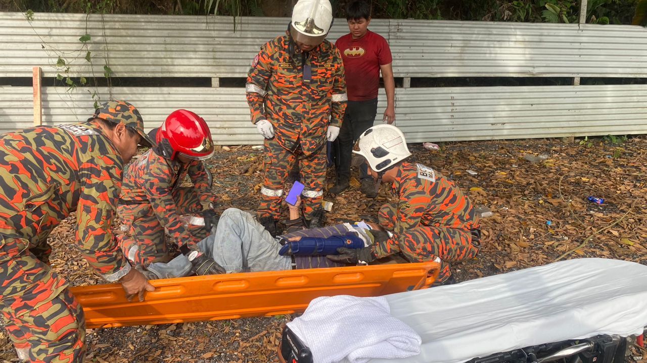 罗里失控冲进10米山沟 华裔司机左手骨折