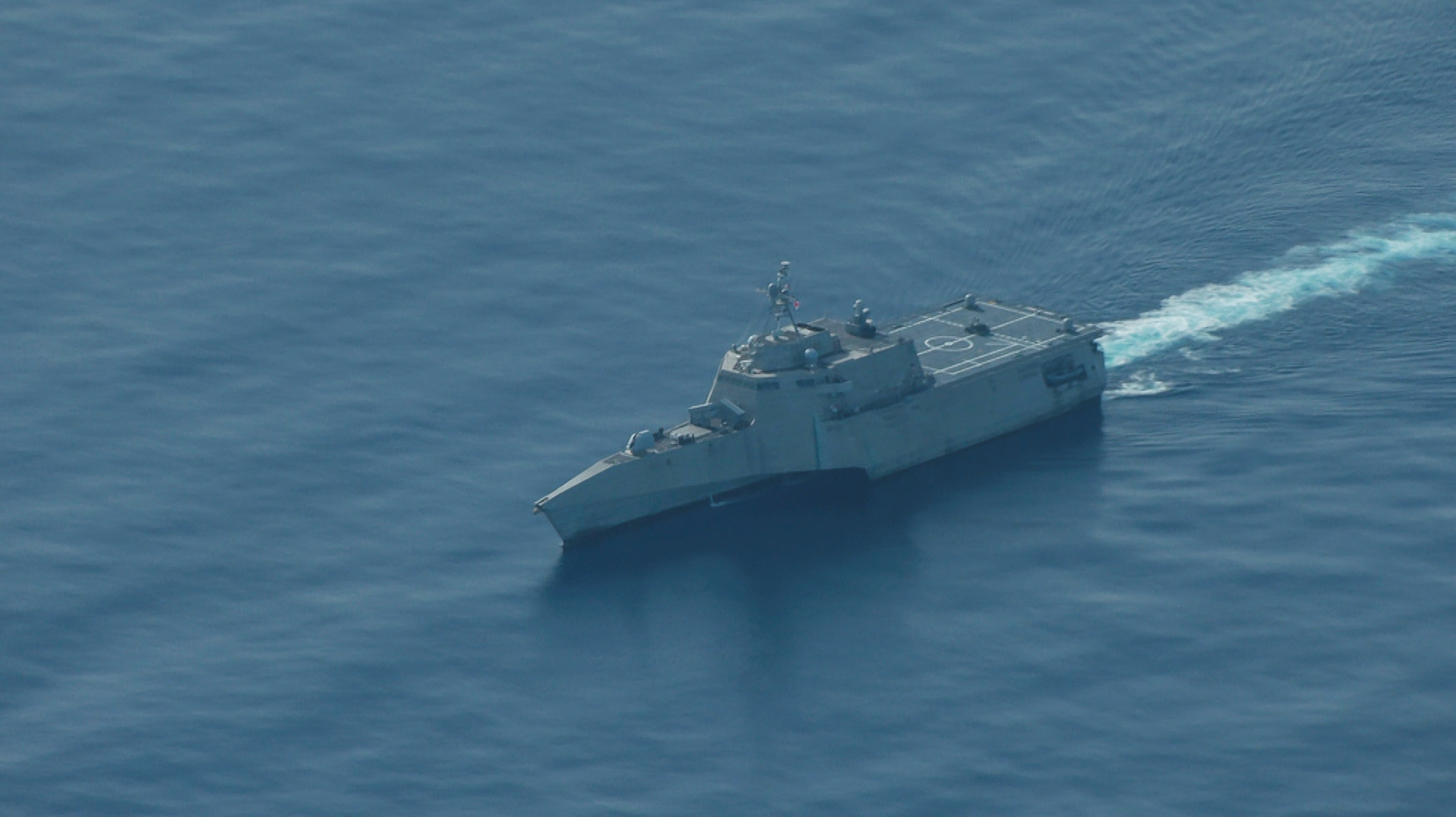Chinese fighter 'intercepts' Philippine plane over disputed shoal, Manila says