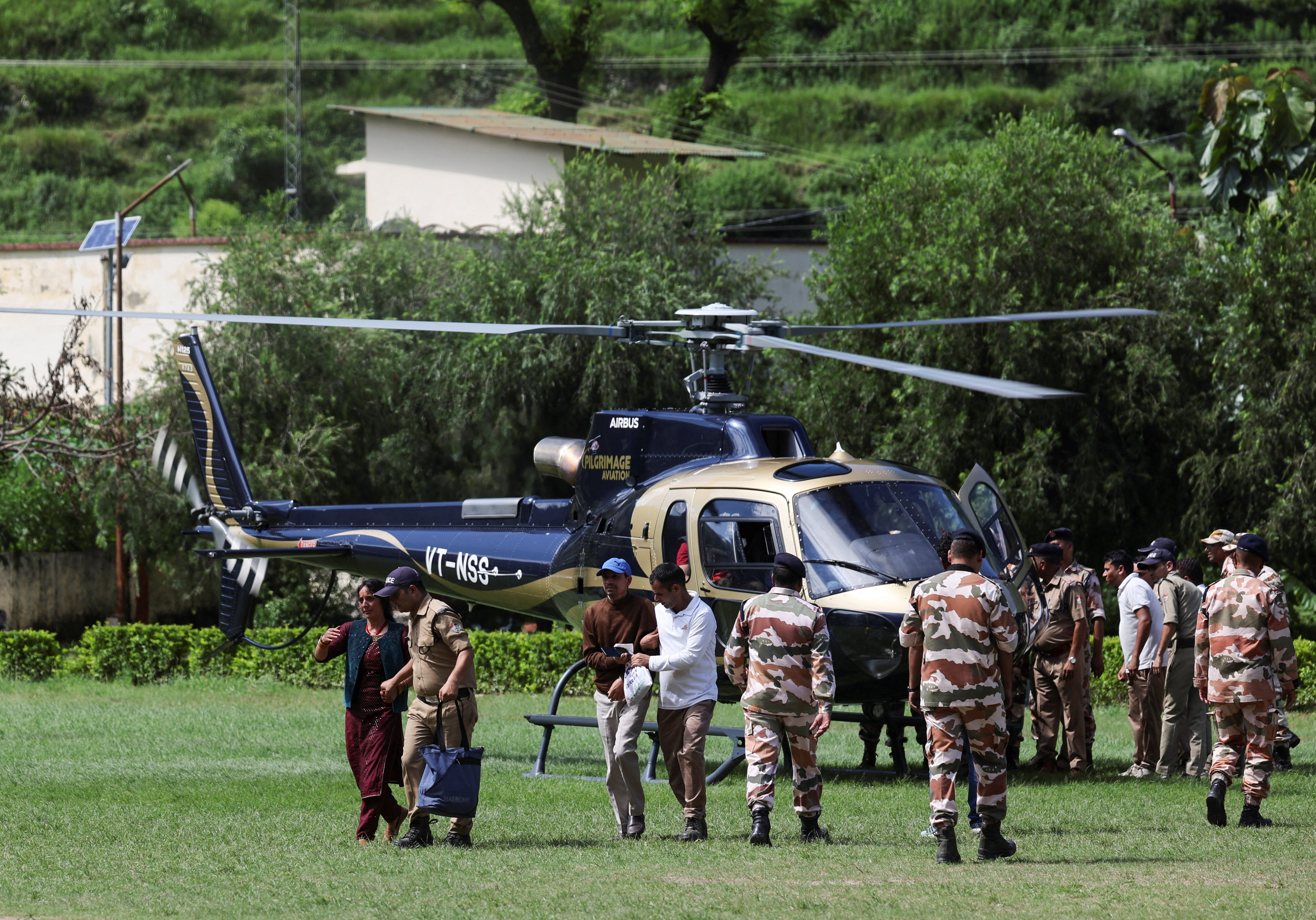 Helicopters rescue people stranded by floods on key India pilgrim route
