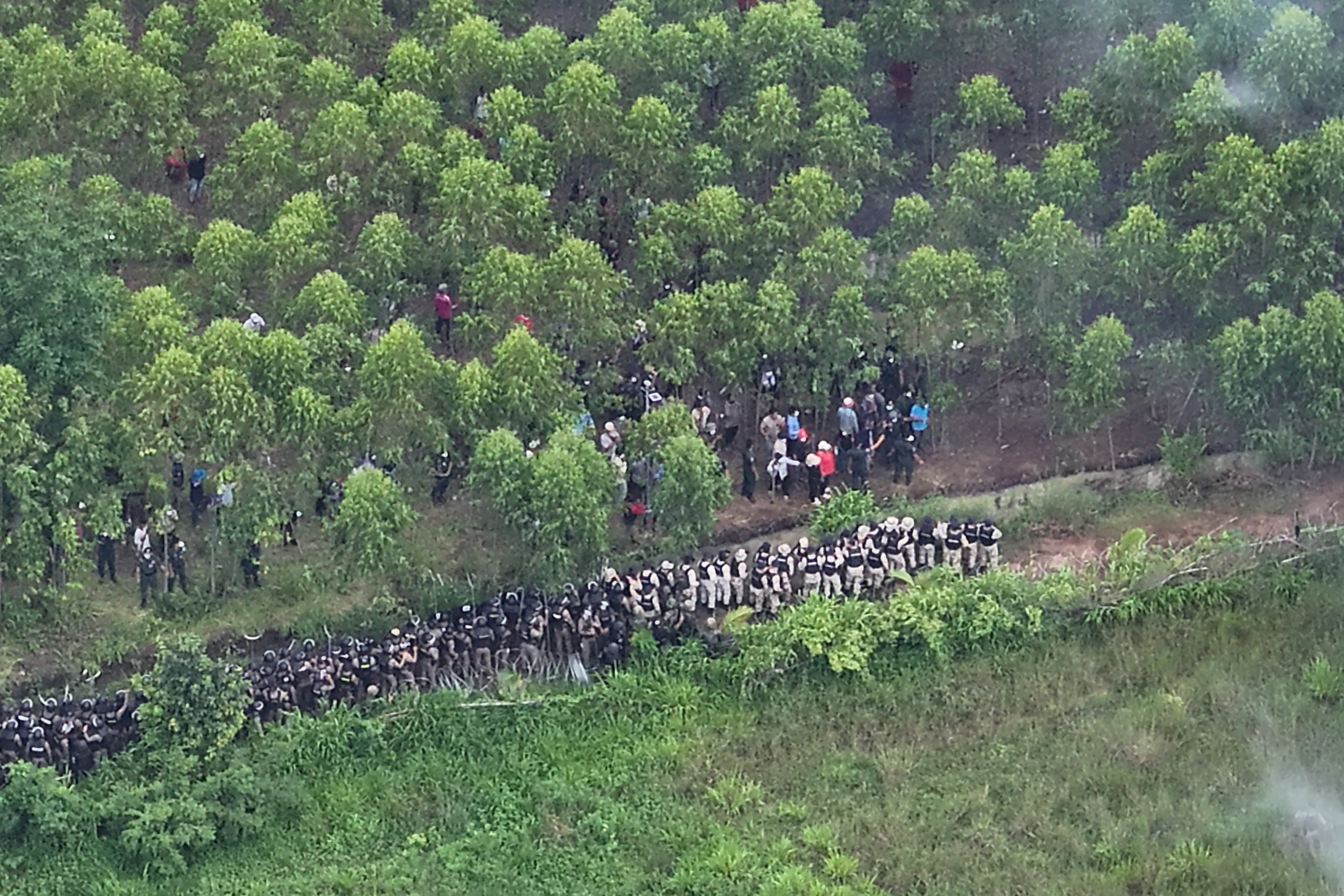 Thai police fire tear gas at Cambodian protesters at disputed border village