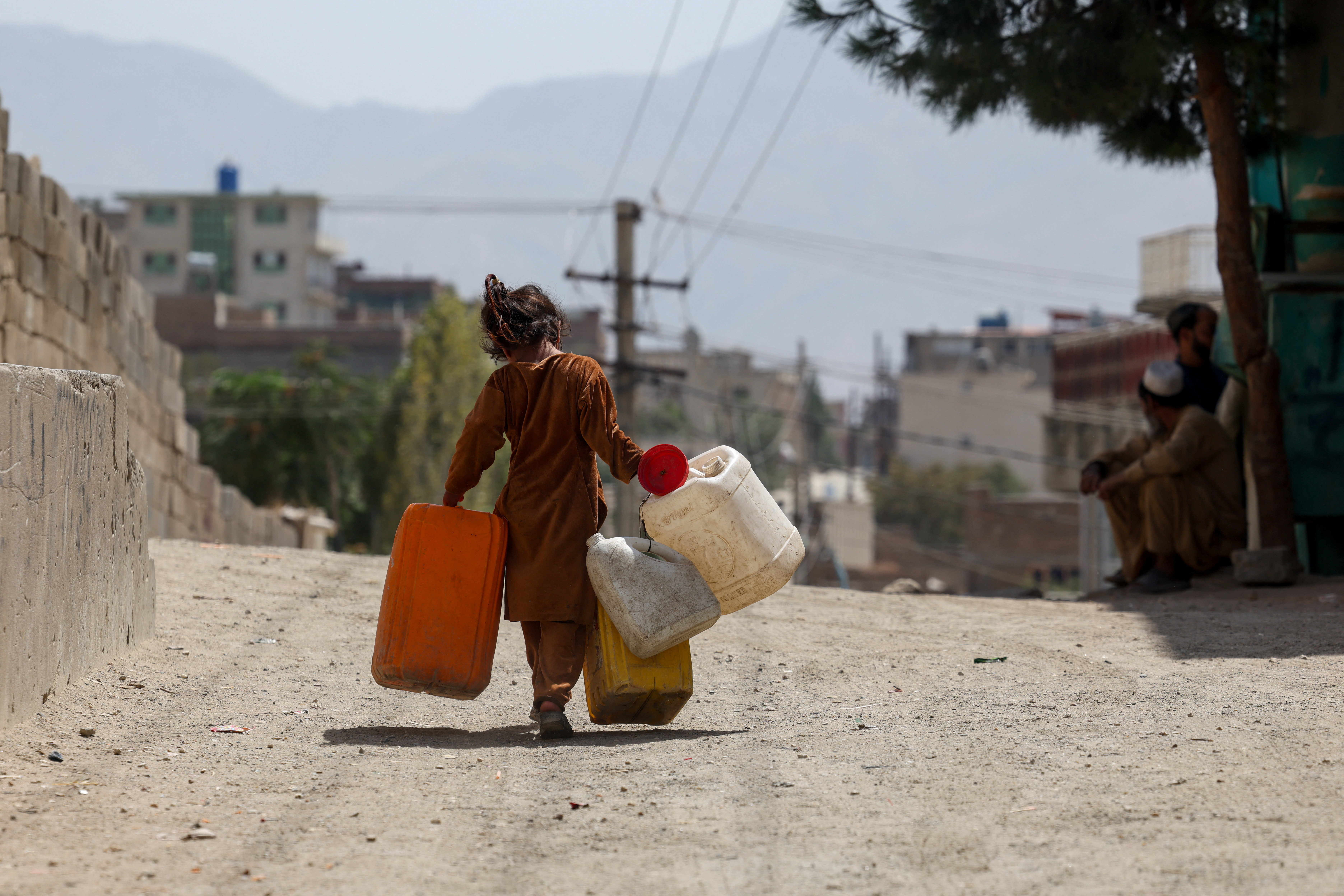 Afghan wells run dry, kids quit school to queue for water