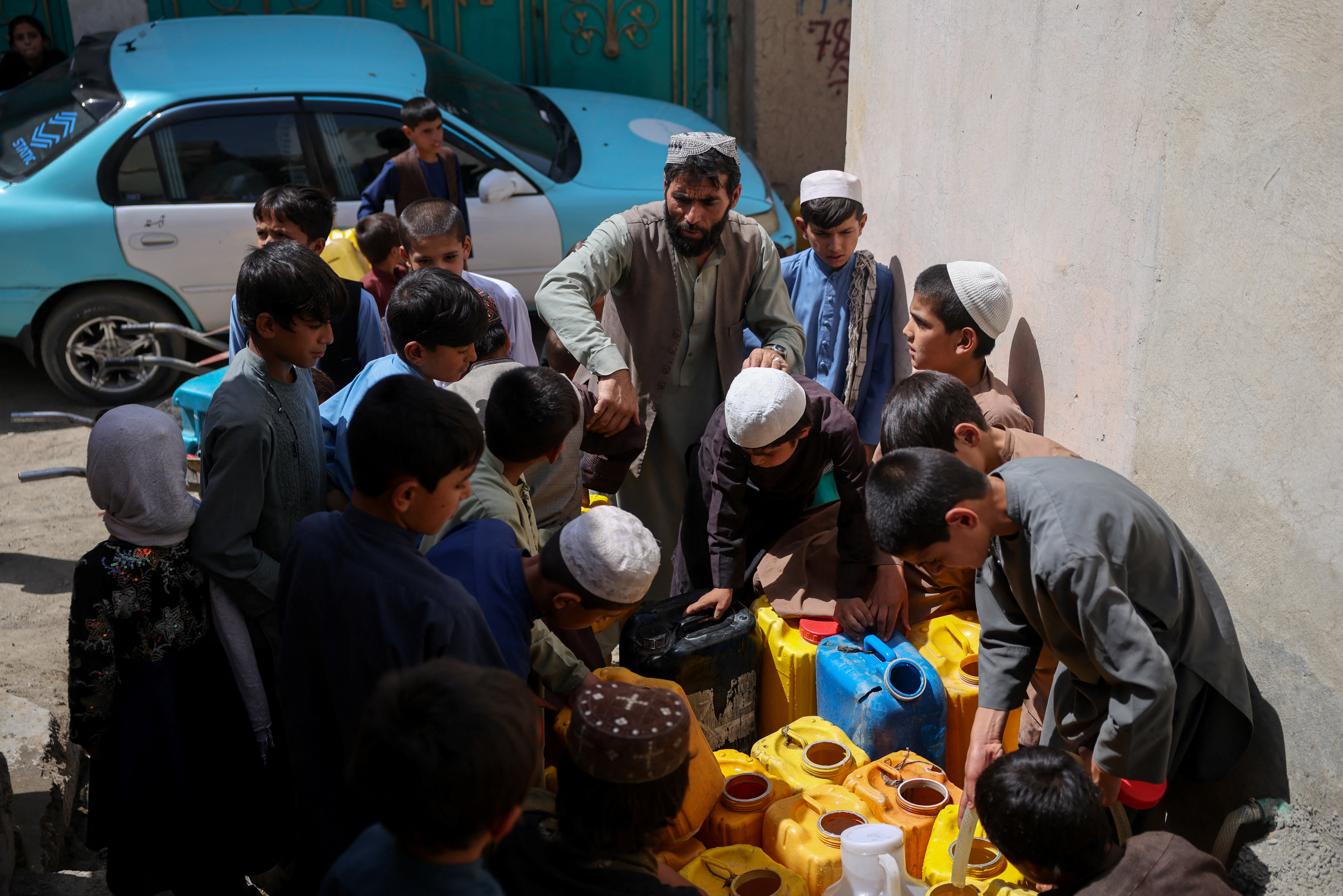 Afghan wells run dry, kids quit school to queue for water