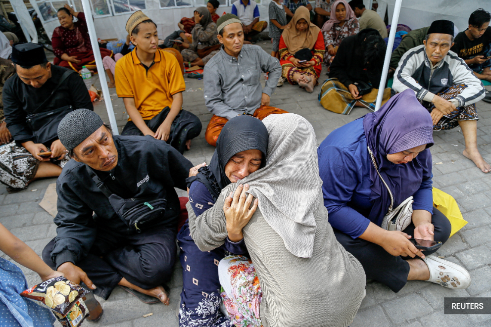 Indonesian rescuers hunt 38 missing after Islamic school collapse