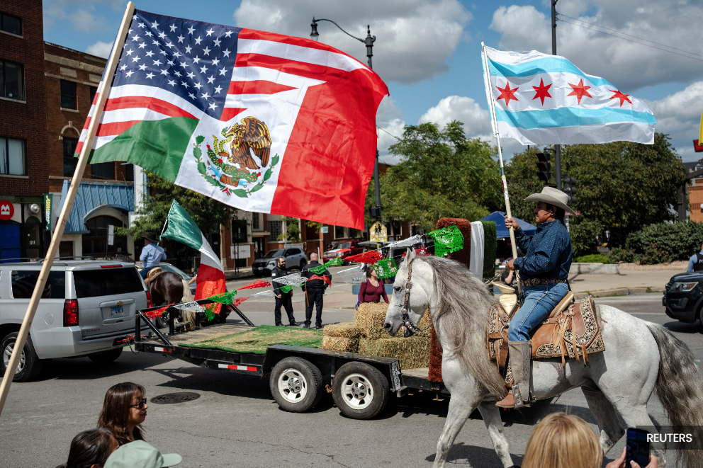 Chicago protesters defiant in face of Trump's deportation threats