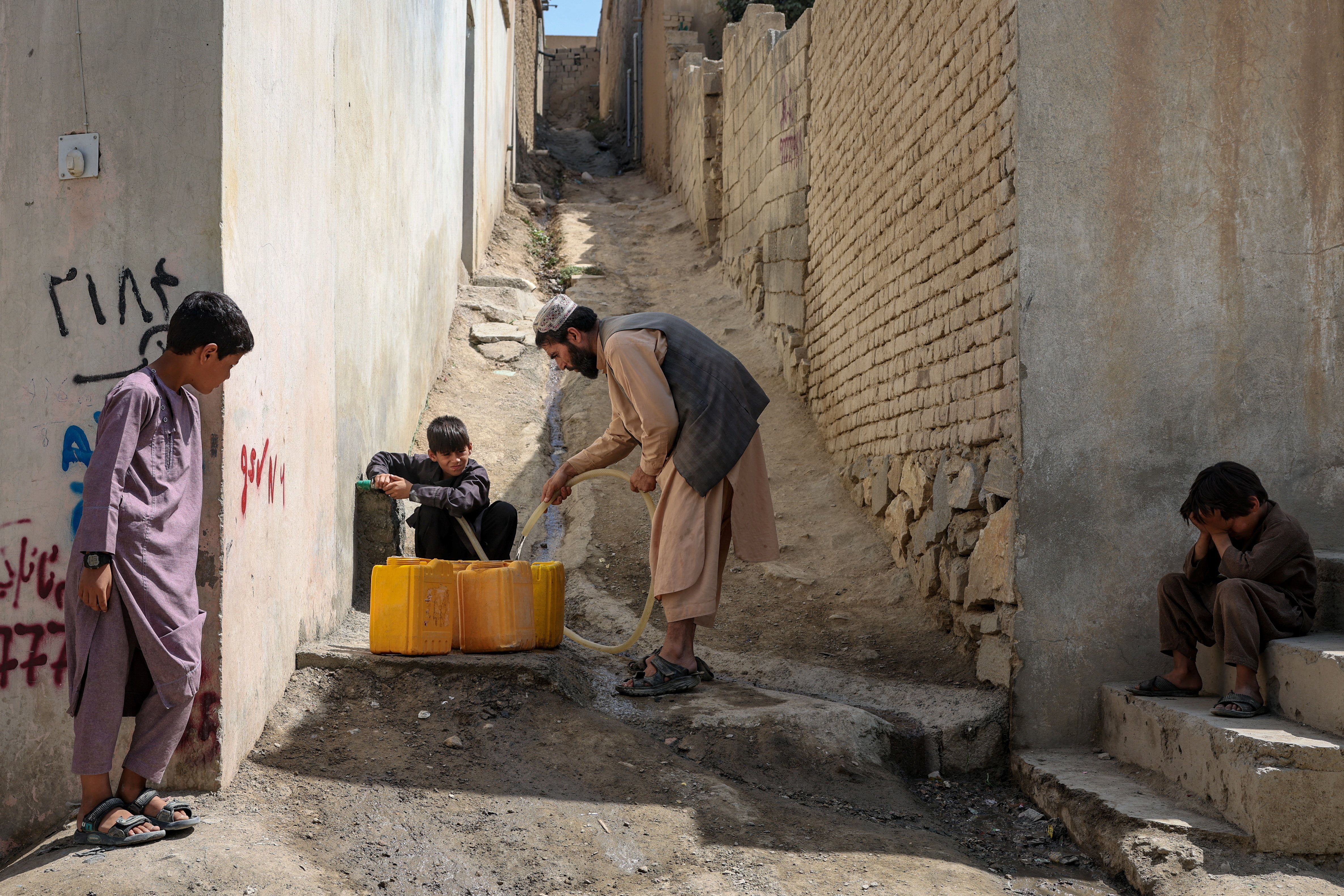 Afghan wells run dry, kids quit school to queue for water