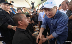 灾难优先·政治暂放一边  沙巴首长坚守救援重任