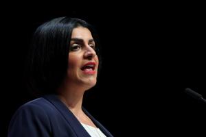 UK plans tougher residency rules based on English skills, civic conduct