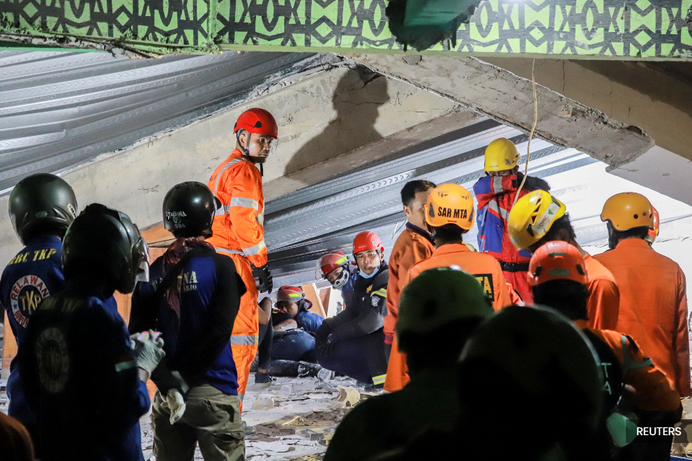 Indonesian rescuers hunt 38 missing after Islamic school collapse