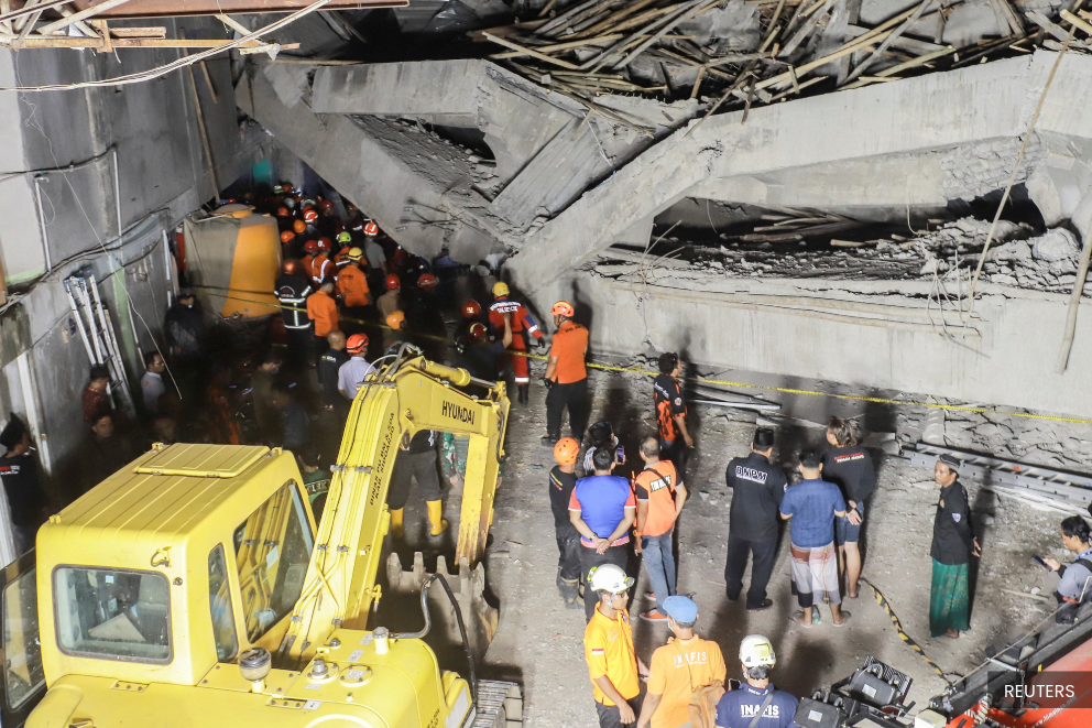 At least 50 bodies recovered after Indonesian school collapse, 13 remain missing