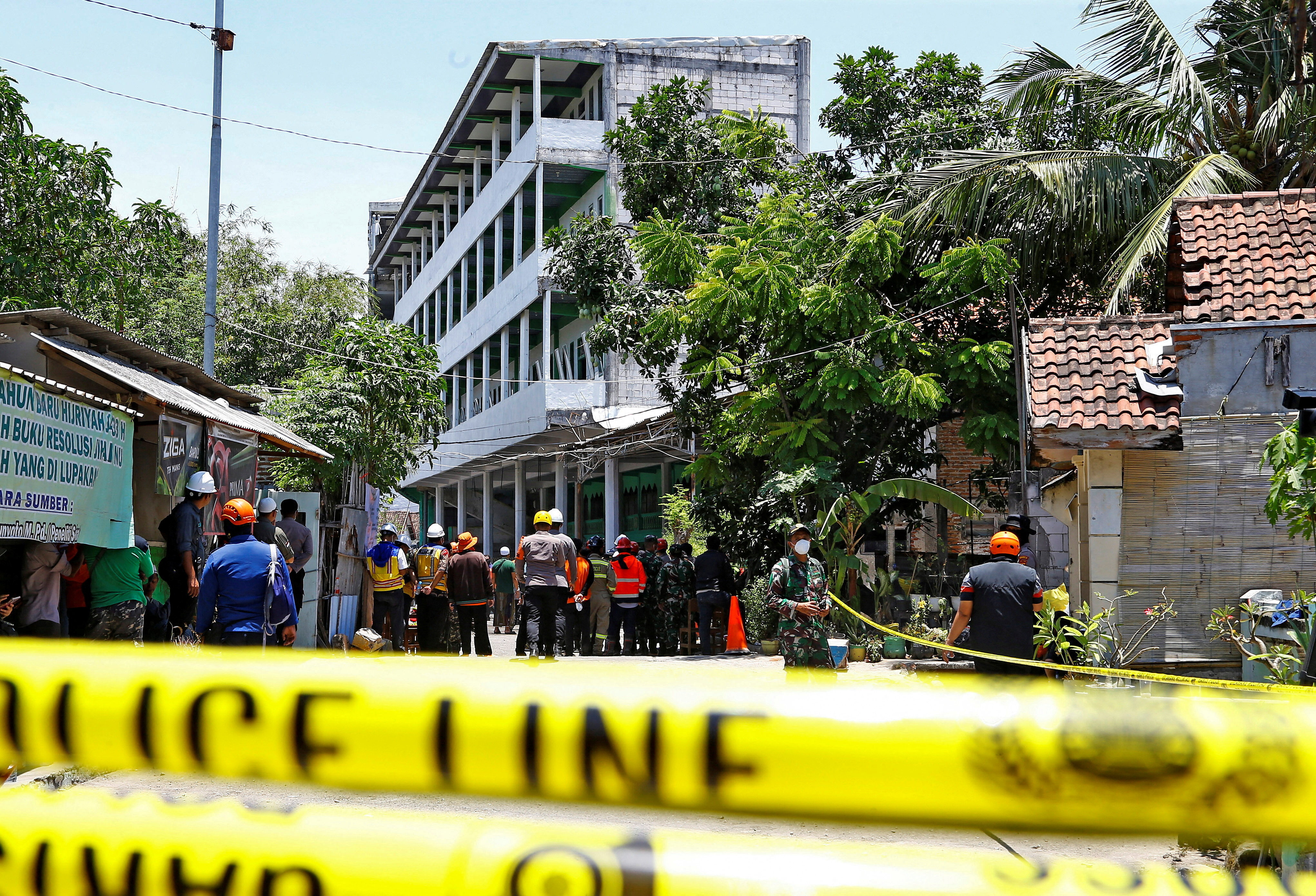At least 50 bodies recovered after Indonesian school collapse, 13 remain missing