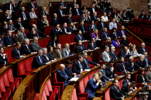 French PM faces fraught budget talks after surviving no-confidence votes