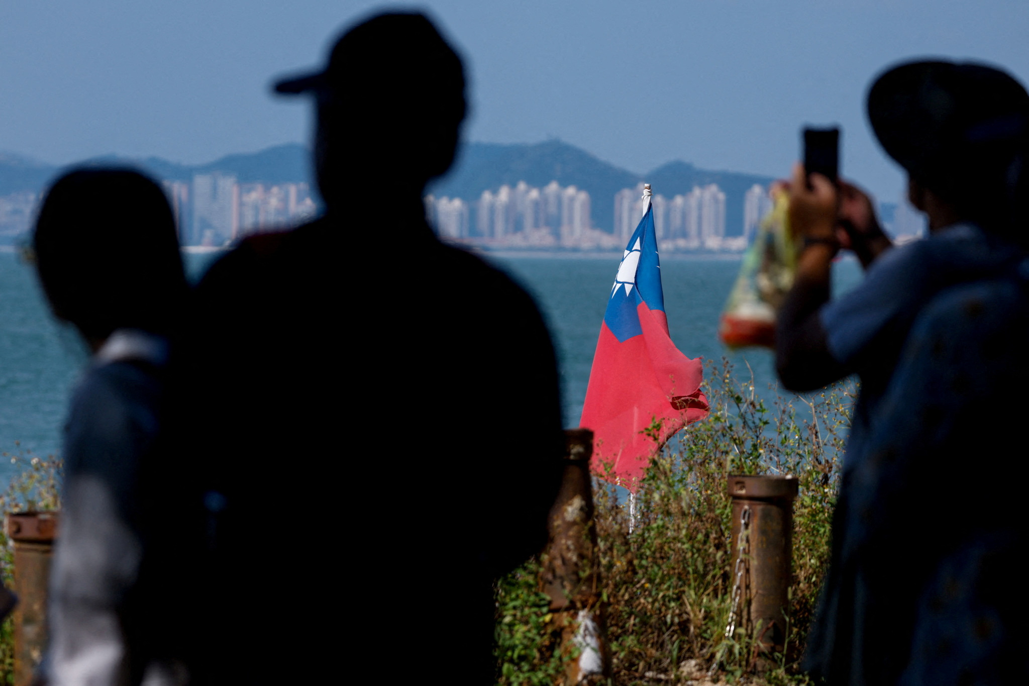 China says ‘absolutely will not’ rule out use of force over Taiwan