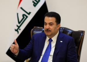 Iraq PM says can only disarm factions when US withdraws