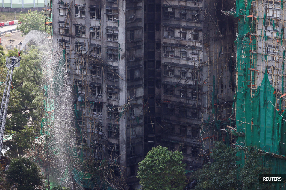 Hong Kong orders judge-led probe into fire that killed 151