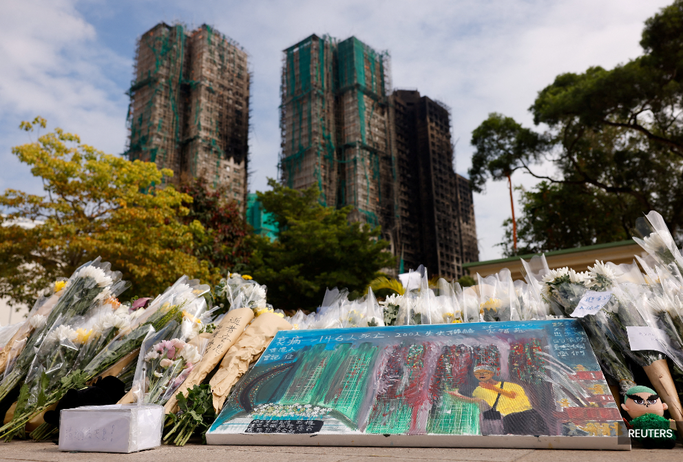 Hong Kong orders judge-led probe into fire that killed 151