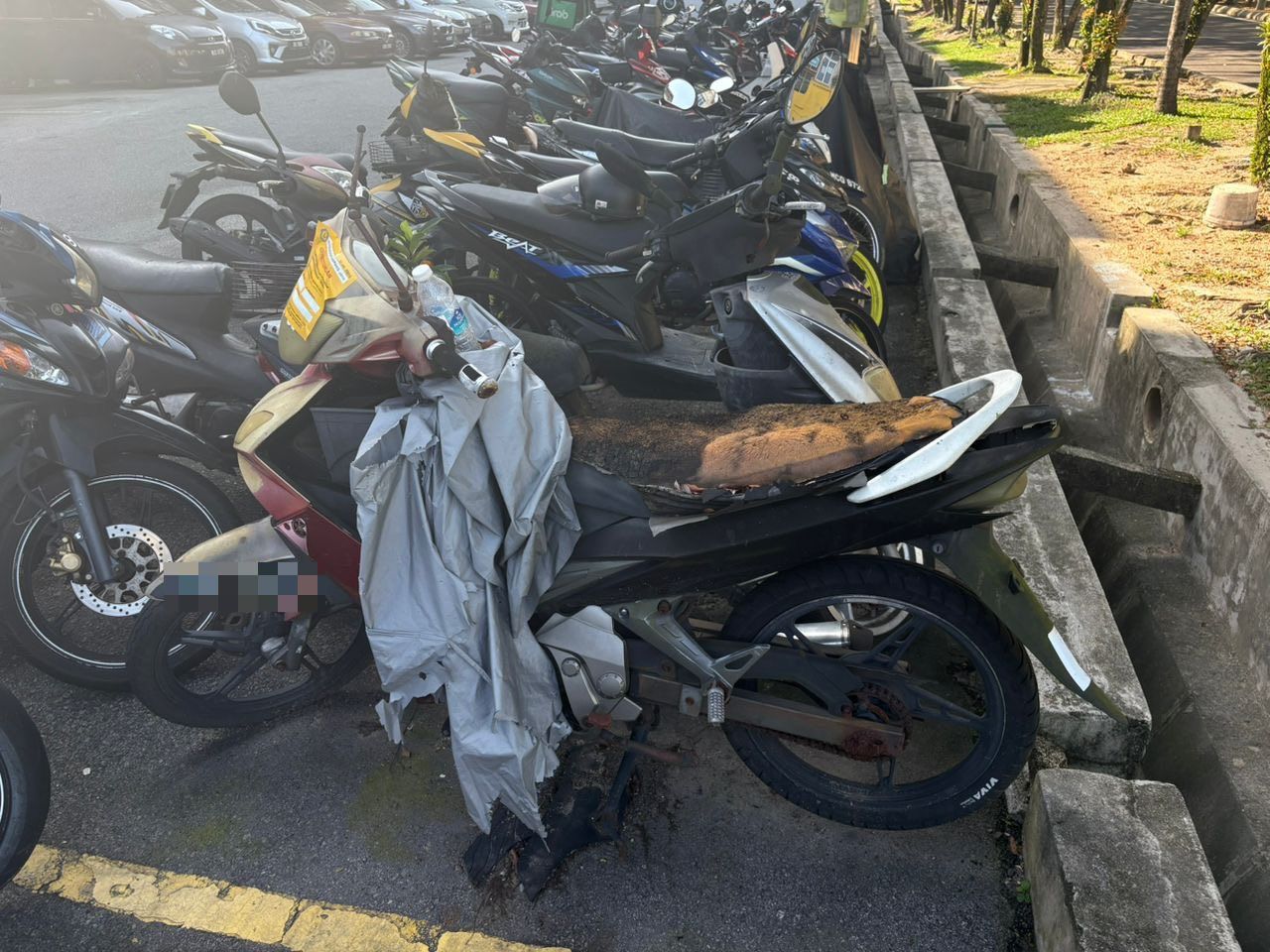 保障民众安全及环境卫生  安邦市会拖走7废弃摩托