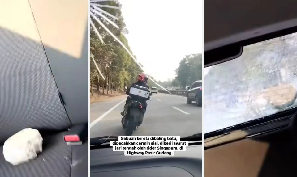 突换车道.不满被鸣笛 摩哆骑士掷石击碎轿车后镜