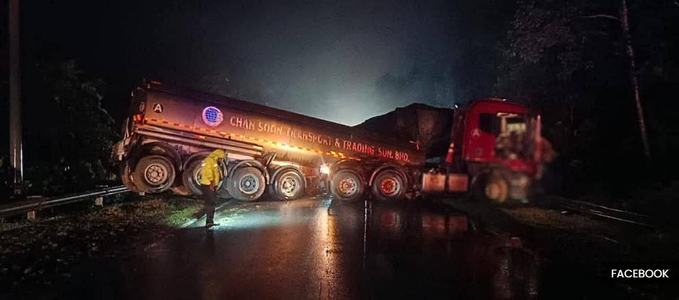 油罐车疑失控撞拖格罗里 2司机受伤.衍生5公里车龙