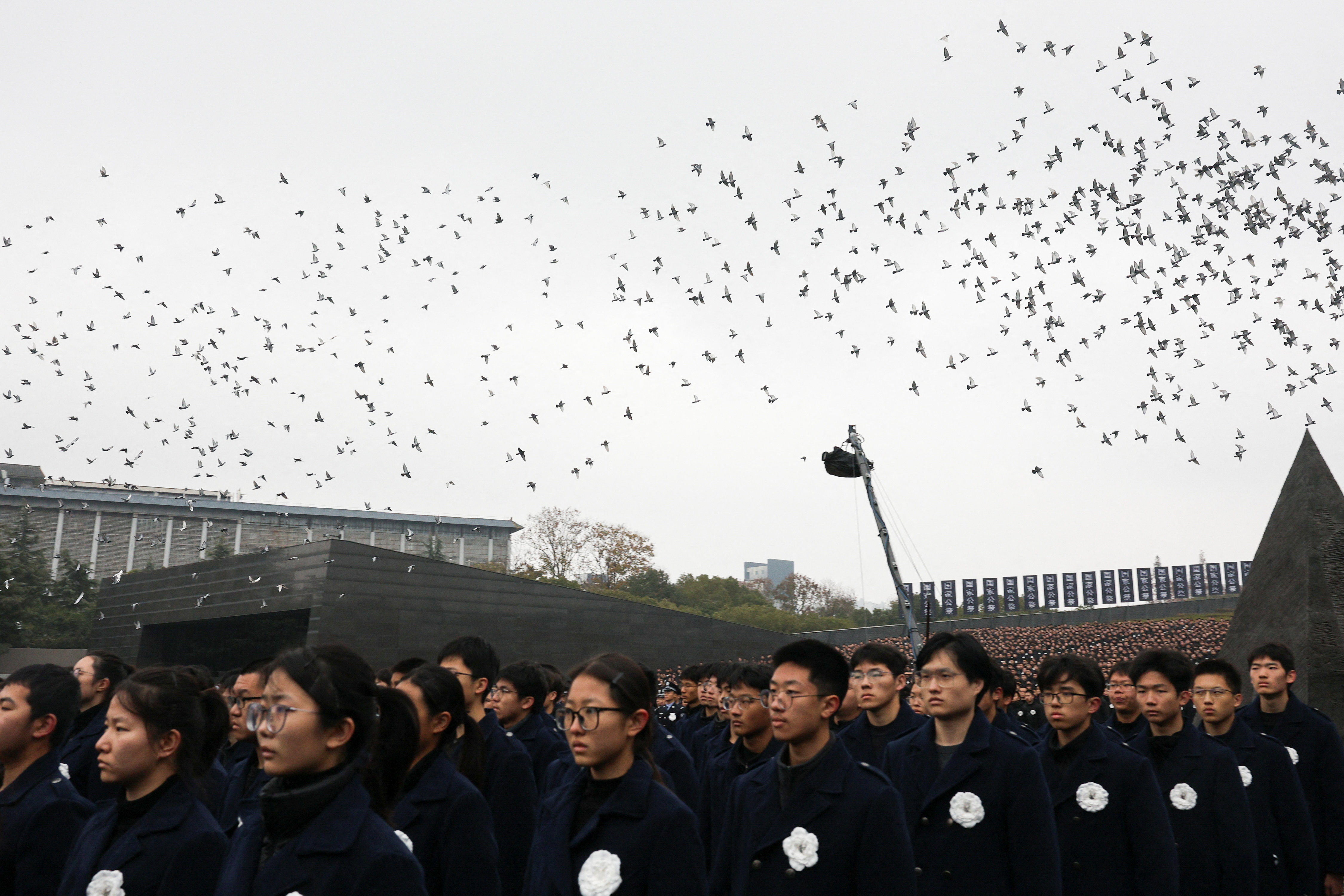 China holds Nanjing Massacre memorial despite Japan tensions