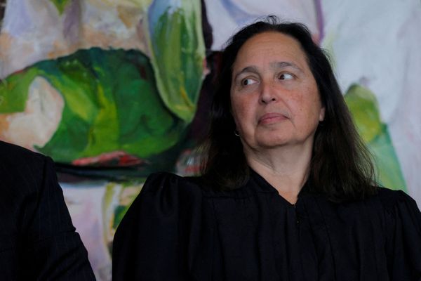 US judge blocks Washington push to end legal status of 8,400 migrants