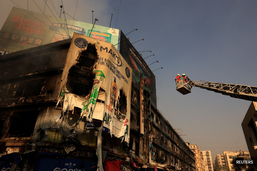 Dozens missing after massive Karachi mall fire, 21 killed