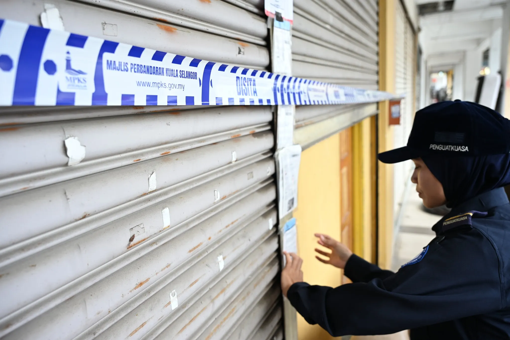 瓜雪市会检举“劳板”商铺  发18张罚单.查封3店