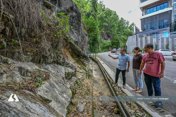 武吉柏迈5路斜坡喷浆层脱落 游佳豪促安邦市会速修复裂痕