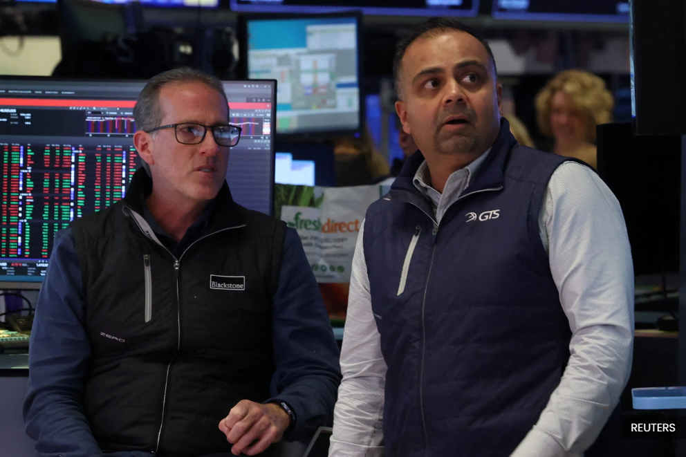 Wall Street futures, dollar fall on Trump tariff tumult