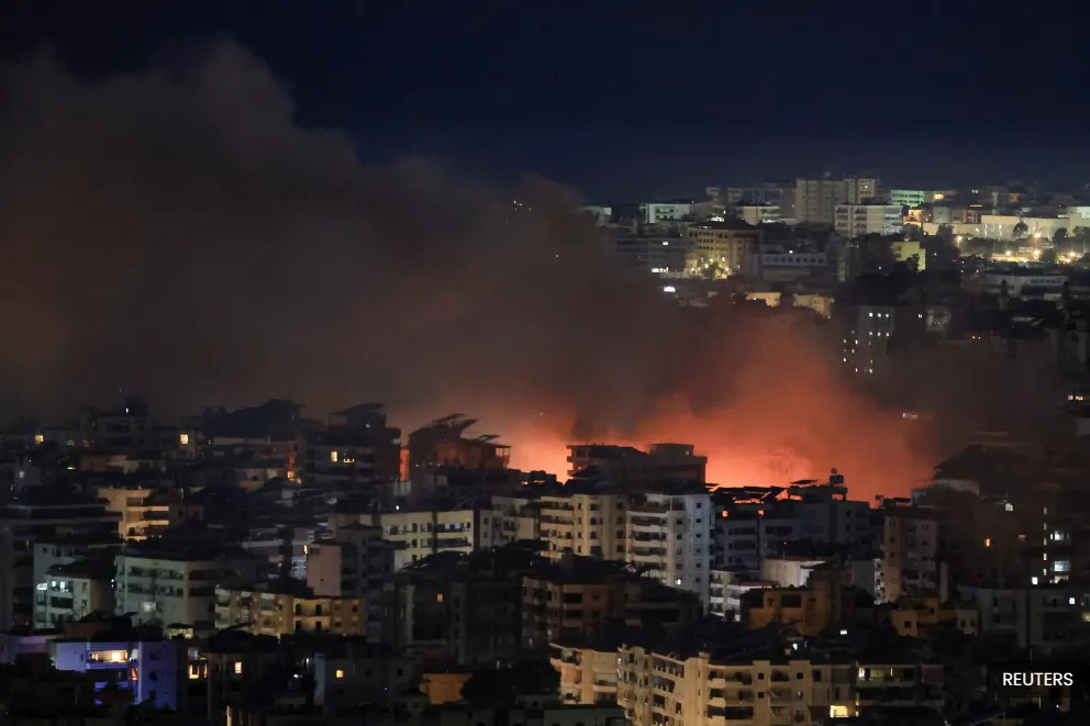 Israeli airstrikes pound Beirut suburb, Hezbollah warns Israelis