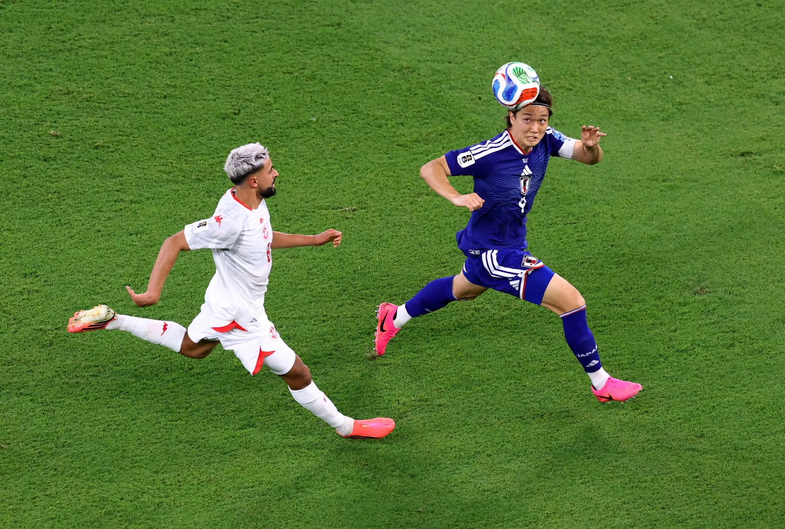 Japan rout Tunisia 4-0 as Ueda shines in World Cup's 1,000th match