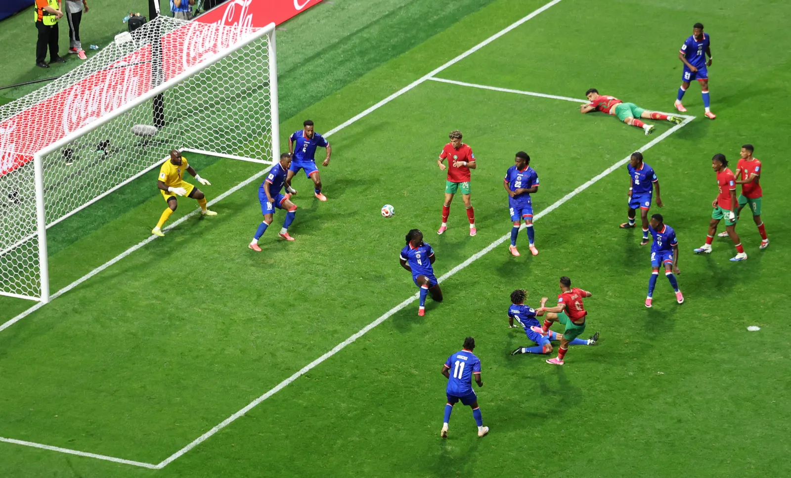 Morocco earn comeback win over Haiti to reach last 32 as runners-up
