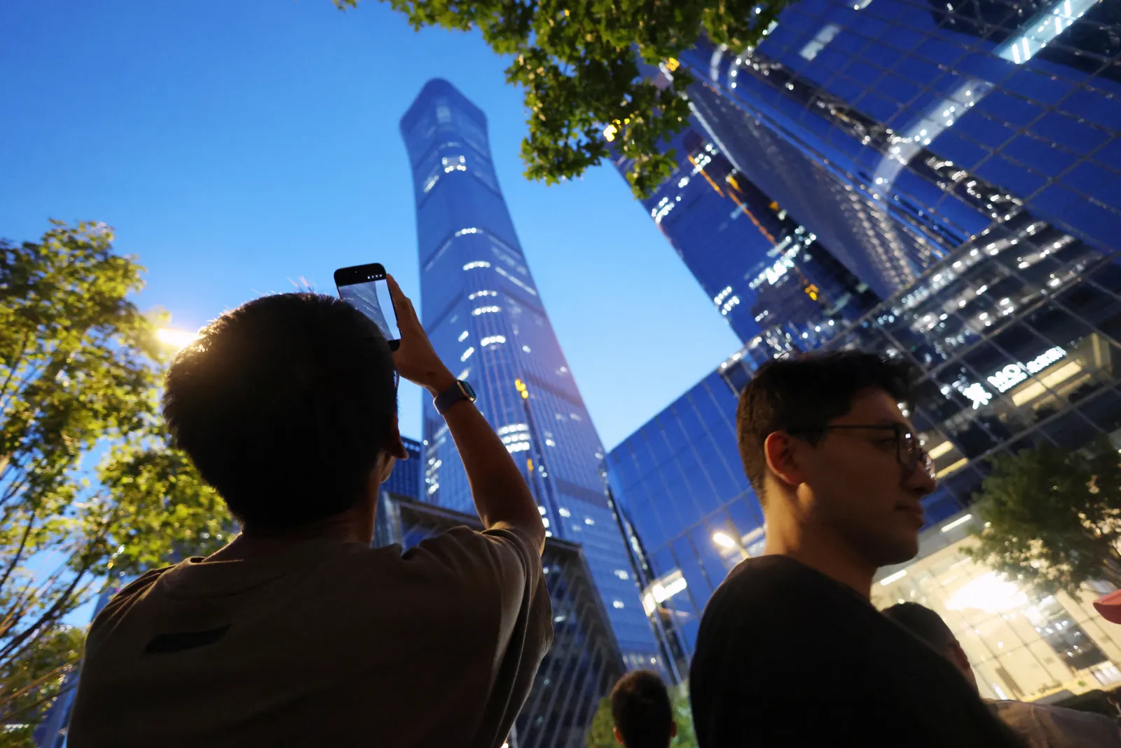 Small aircraft hits Beijing skyscraper, eyewitnesses say