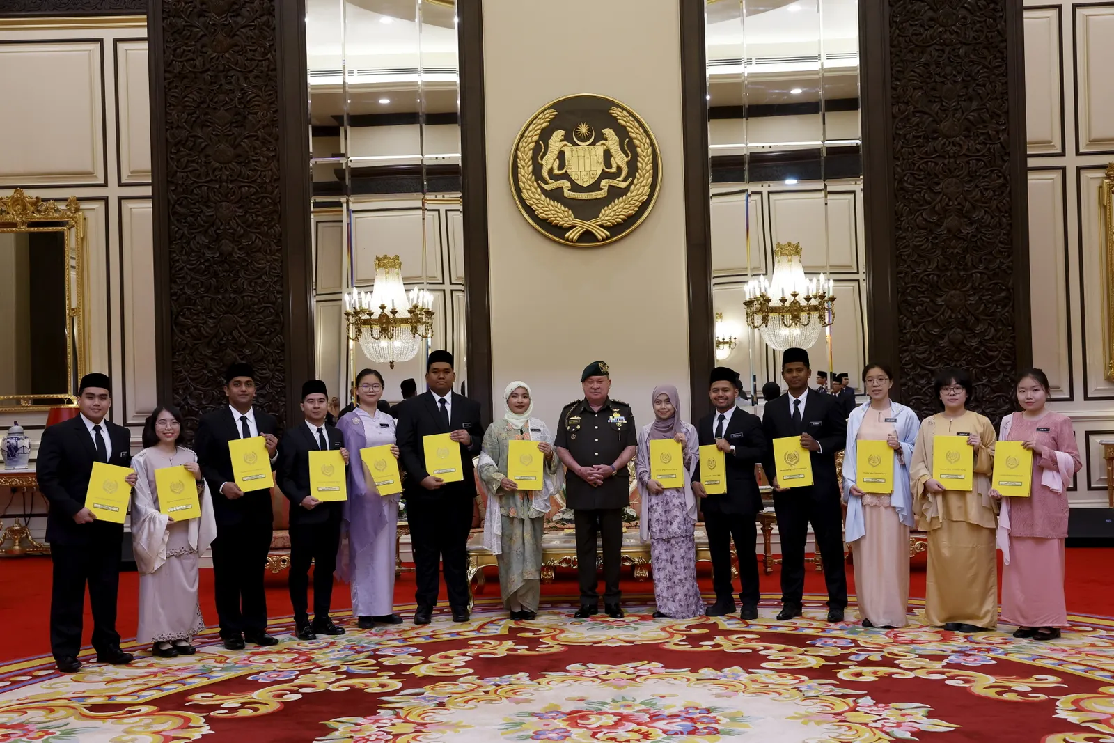 King presents BYDPA scholarships to 14 recipients