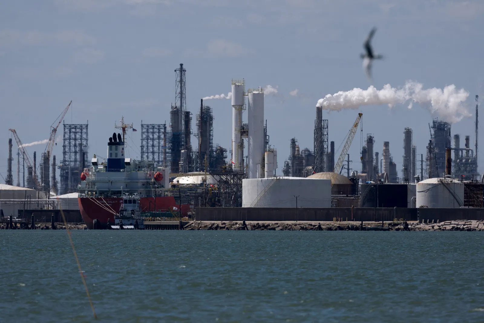 Oil falls after OPEC+ agrees to raise output targets