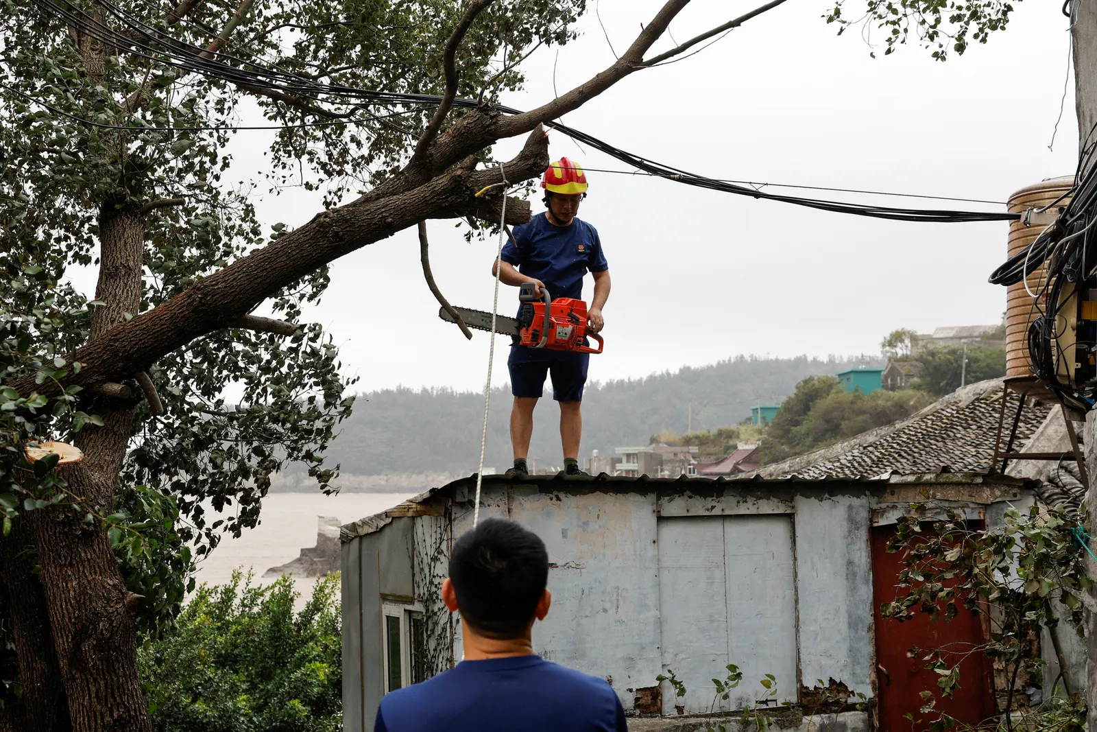 Typhoon Bavi batters eastern China, threatens days of heavy rain