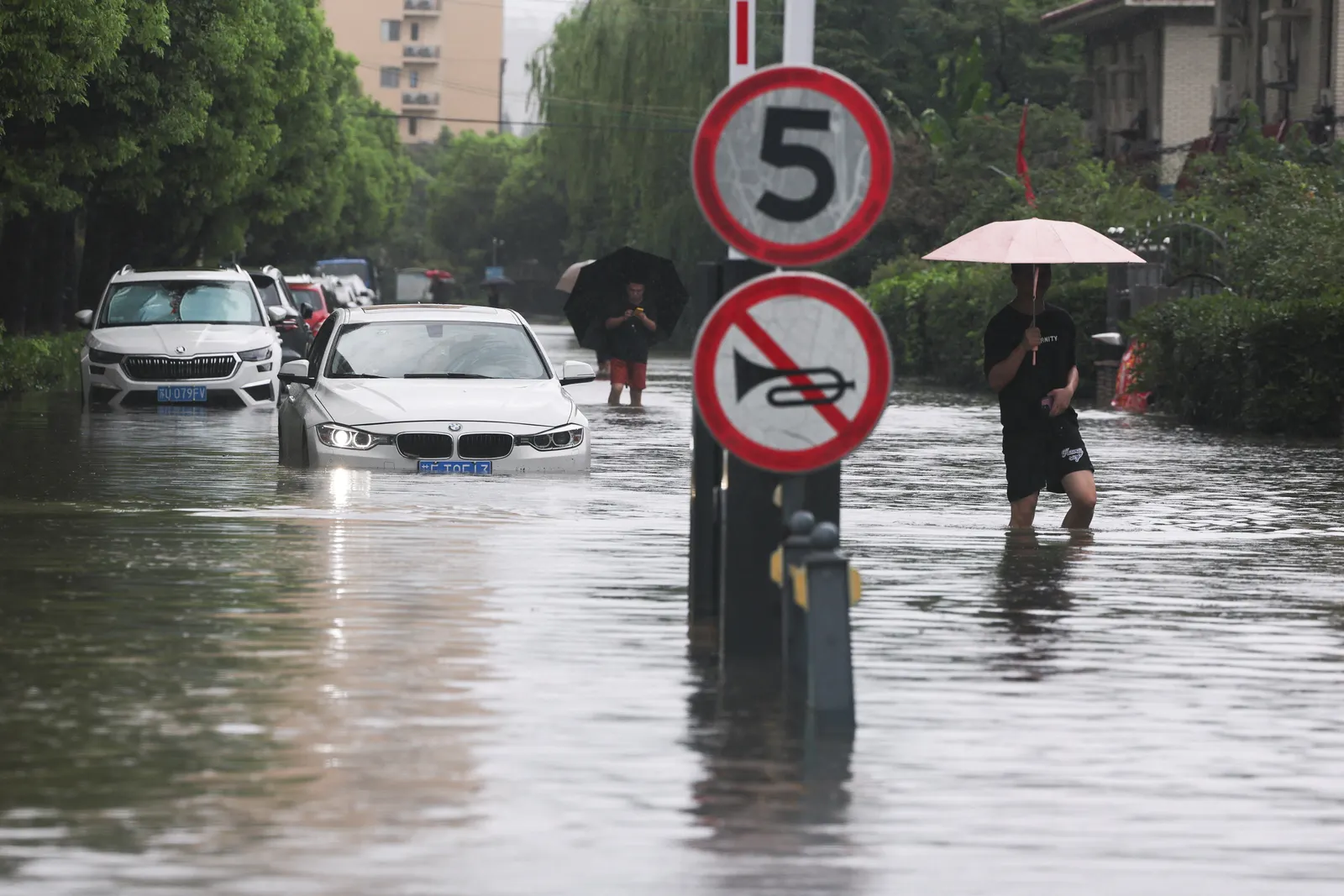 Storms from Dolphin soak China's east, ground over 900 Shanghai flights