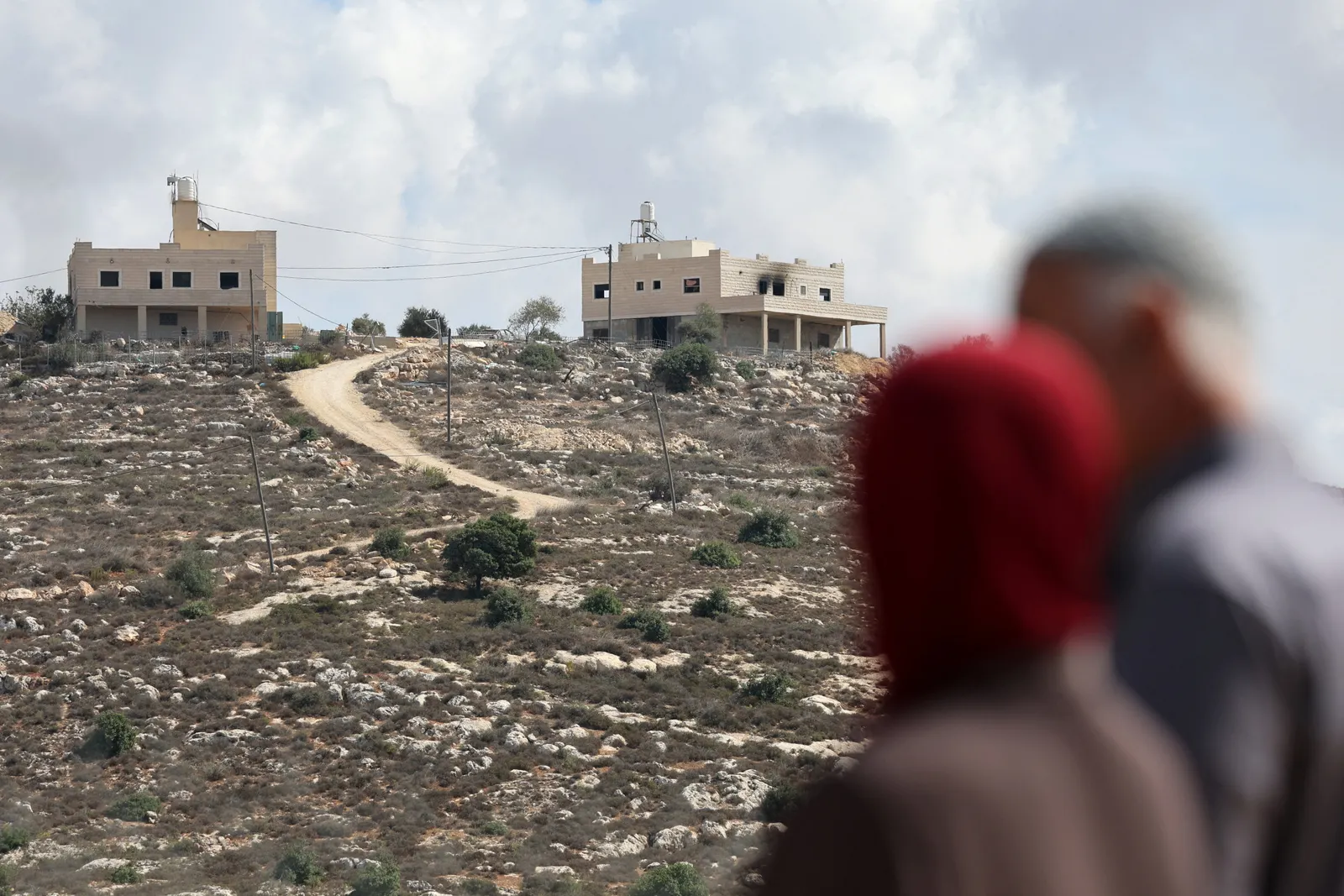 Israeli settlers attack West Bank village, blocking family's return home