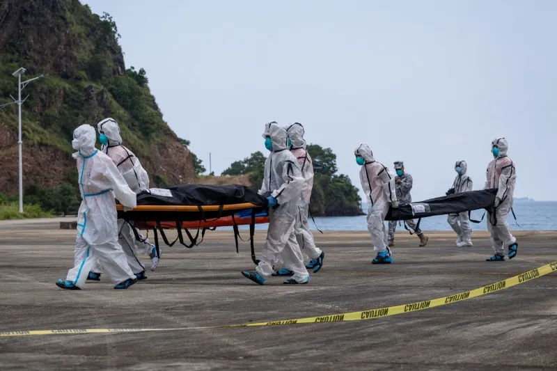 Philippines starts identifying victims from ferry fire as dozens still missing