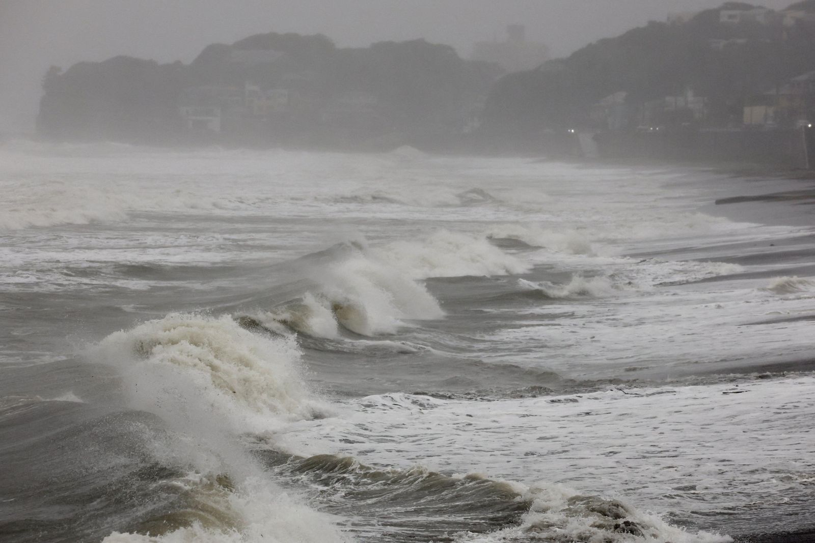Typhoon approaches eastern Japan, prompting flood, landslide warnings